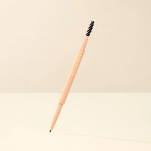 Brow Micro Sculpting Pencil in Dark Brown by Lenoites, featuring a dual-ended pencil with a spoolie brush on one end and a fine pencil tip on the other, displayed against a soft beige background.