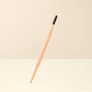 Brow Micro Sculpting Pencil in Light Brown by Lenoites, featuring a dual-ended pencil with a spoolie brush on one end and a fine pencil tip on the other, displayed against a soft beige background.